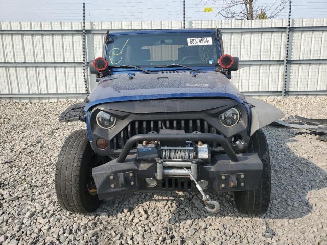Photo 5 from auction – 2010 JEEP WRANGLER U with VIN 1J4BA6H19AL113025