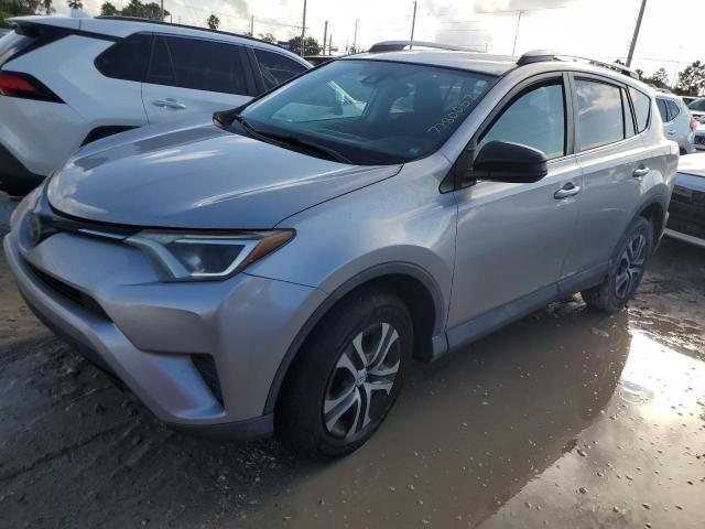 TOYOTA RAV4 LE 2018 with VIN 2T3ZFREV3JW420766 - Photo from auction