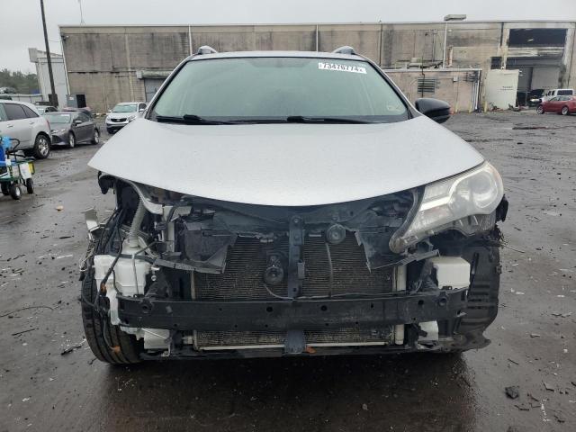 Photo 5 from auction – 2014 TOYOTA RAV4 LE with VIN JTMZFREV6EJ021595