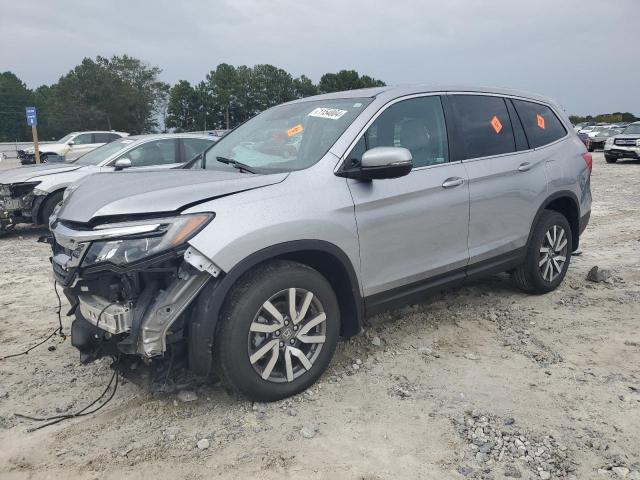 HONDA PILOT EXL 2021 with VIN 5FNYF5H50MB009481 - Photo from auction