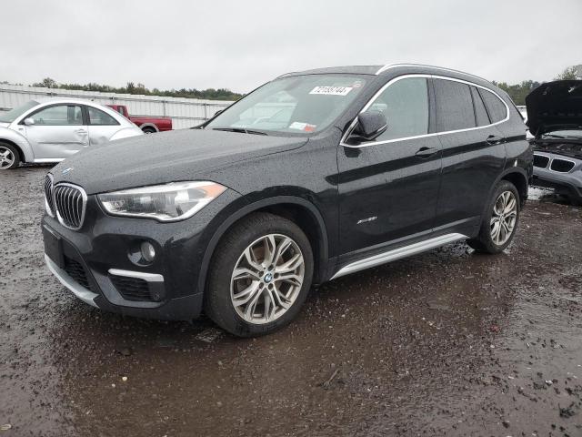 BMW X1 XDRIVE2 2016 with VIN WBXHT3Z32G4A51288 - Photo from auction