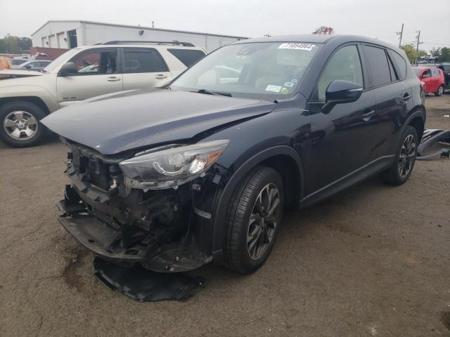 MAZDA CX-5 GT 2016 with VIN JM3KE4DY2G0796124 - Photo from auction