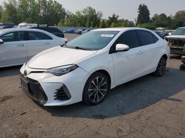 TOYOTA COROLLA L 2018 with VIN 5YFBURHE3JP791682 - Photo from auction
