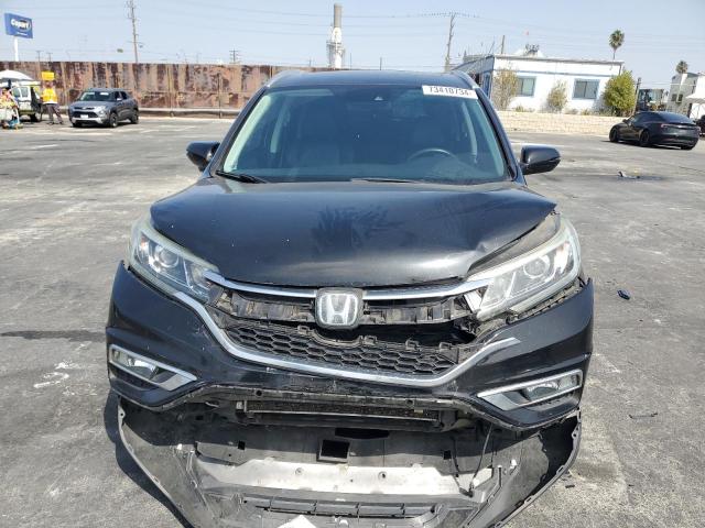 Photo 5 from auction – 2016 HONDA CR-V TOURI with VIN 5J6RM3H93GL007902