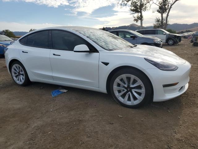 Photo 4 from auction – 2022 TESLA MODEL 3 with VIN 5YJ3E1EB8NF321369