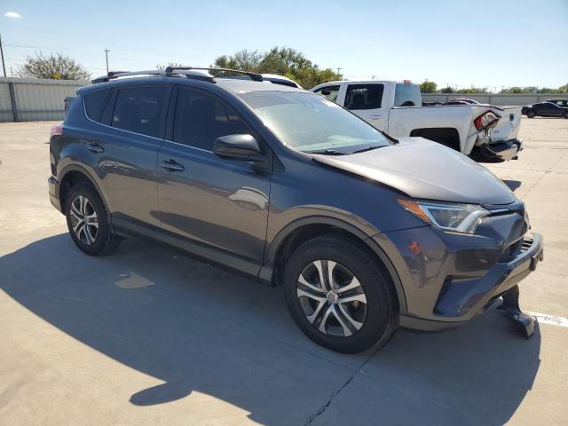 Photo 4 from auction – 2018 TOYOTA RAV4 LE with VIN JTMZFREV4JJ160375