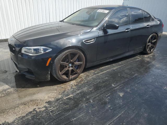 BMW M5 2014 with VIN WBSFV9C56ED593542 - Photo from auction