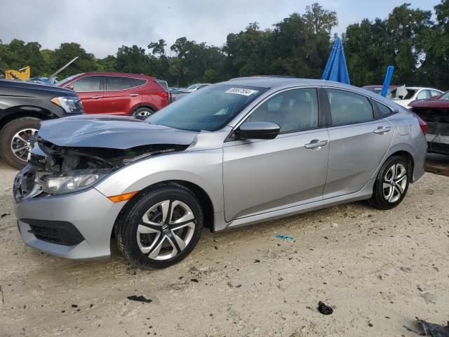 HONDA CIVIC LX 2017 with VIN 19XFC2F52HE059845 - Photo from auction