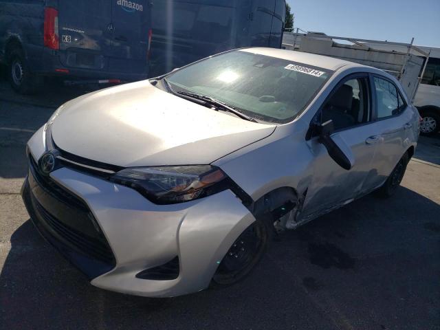 TOYOTA COROLLA L 2019 with VIN 5YFBURHE4KP891632 - Photo from auction