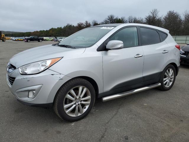 HYUNDAI TUCSON GLS 2011 with VIN KM8JUCAC7BU228569 - Photo from auction