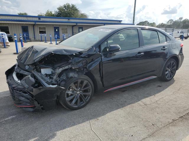 TOYOTA COROLLA LE 2023 with VIN JTDBCMFE8P3022122 - Photo from auction