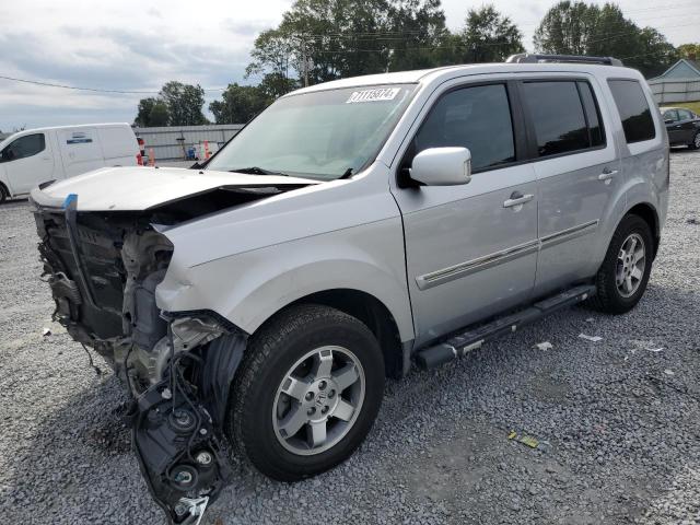HONDA PILOT TOUR 2010 with VIN 5FNYF3H82AB011212 - Photo from auction