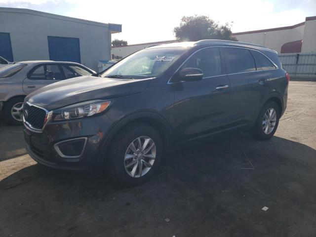KIA SORENTO LX 2016 with VIN 5XYPG4A34GG053587 - Photo from auction