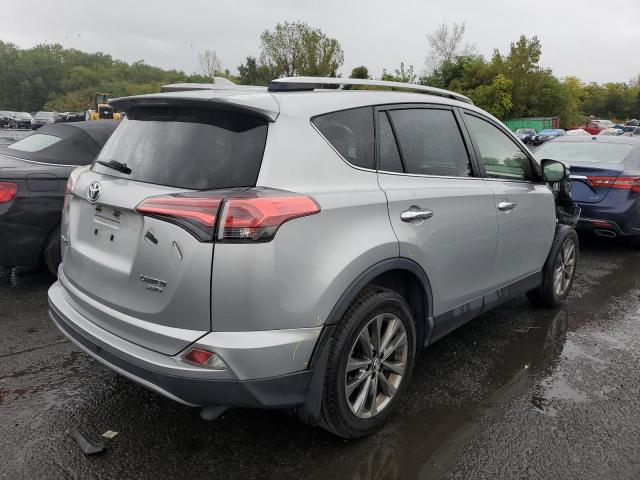 Photo 3 from auction – 2018 TOYOTA RAV4 LIMIT with VIN JTMDFREV2JJ232927