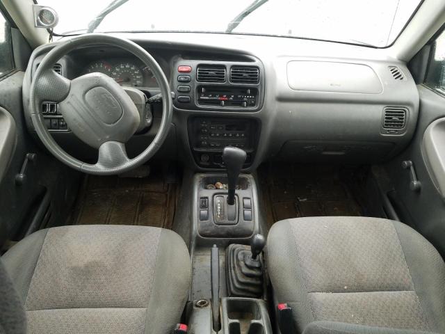 Photo 8 from auction – 2003 CHEVROLET TRACKER with VIN 2CNBJ13C236901119