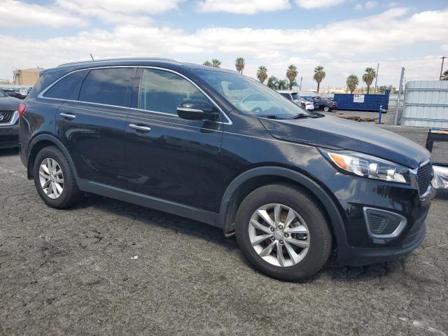 Photo 4 from auction – 2016 KIA SORENTO LX with VIN 5XYPG4A55GG152744