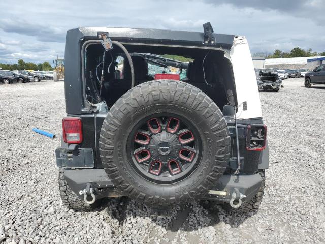 Photo 6 from auction – 2014 JEEP WRANGLER U with VIN 1C4BJWFG7EL111311