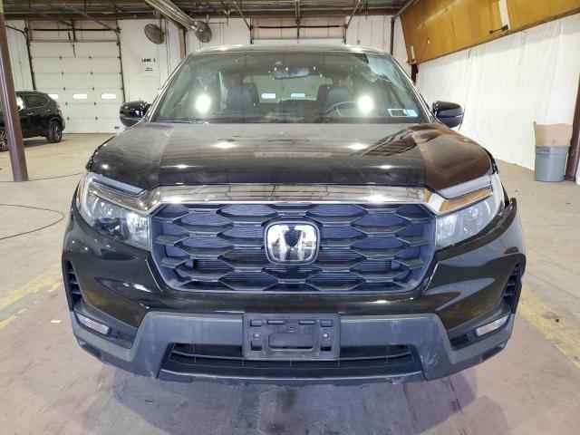 Photo 5 from auction – 2022 HONDA PASSPORT E with VIN 5FNYF8H53NB021935