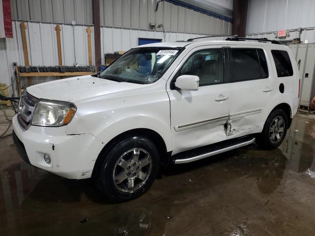 HONDA PILOT TOUR 2011 with VIN 5FNYF4H9XBB036116 - Photo from auction