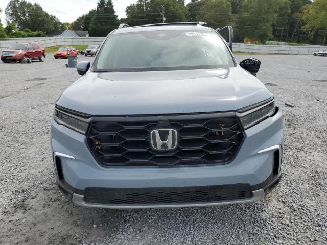 Photo 5 from auction – 2023 HONDA PILOT ELIT with VIN 5FNYG1H82PB043653