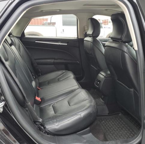 Photo 10 from auction – 2019 FORD FUSION TIT with VIN 3FA6P0RU3KR109556