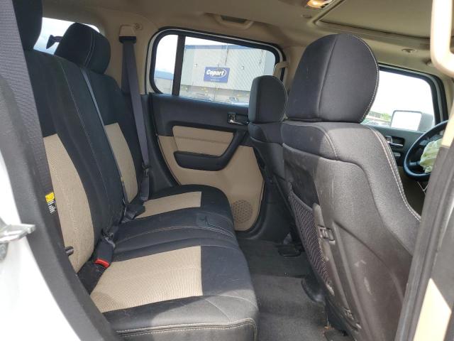 Photo 11 from auction – 2006 HUMMER H3 with VIN 5GTDN136668286254