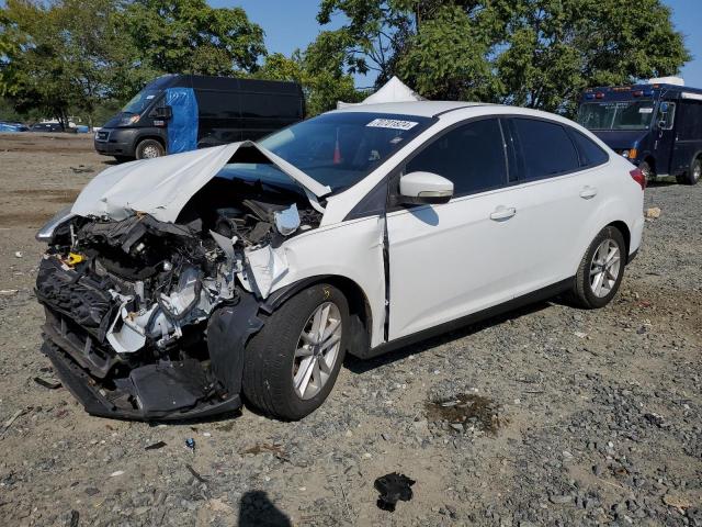 FORD FOCUS SE 2017 with VIN 1FADP3F2XHL326718 - Photo from auction