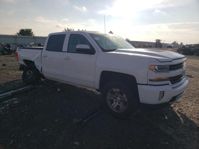 Photo 4 from auction – 2018 CHEVROLET SILVERADO with VIN 3GCUKREC2JG396870