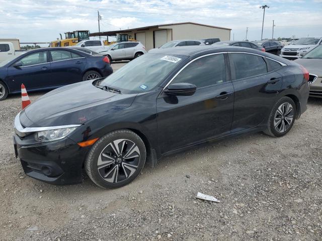 HONDA CIVIC EXL 2018 with VIN JHMFC1F73JX034503 - Photo from auction