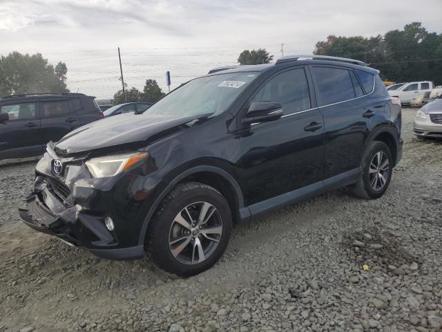 TOYOTA RAV4 XLE 2016 with VIN 2T3WFREV7GW269264 - Photo from auction
