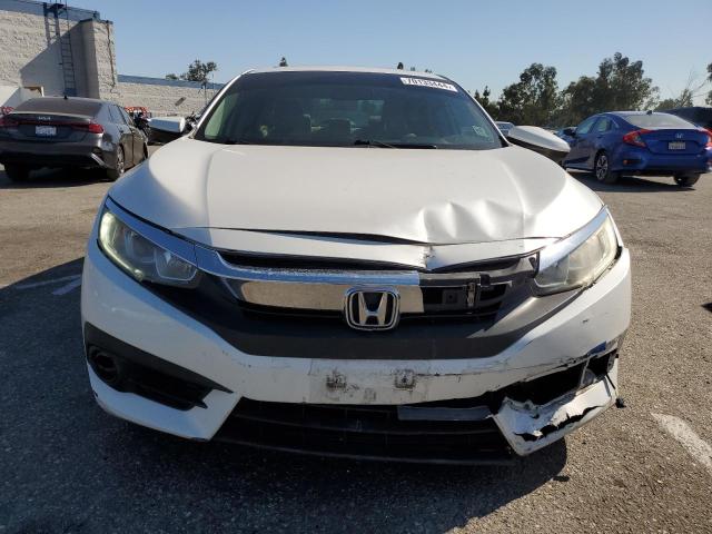 Photo 5 from auction – 2016 HONDA CIVIC EX with VIN 19XFC1F34GE220509