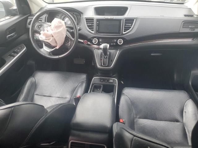 Photo 8 from auction – 2015 HONDA CR-V EXL with VIN 2HKRM4H70FH623571