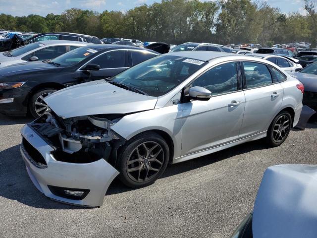 FORD FOCUS SE 2015 with VIN 1FADP3F28FL229482 - Photo from auction