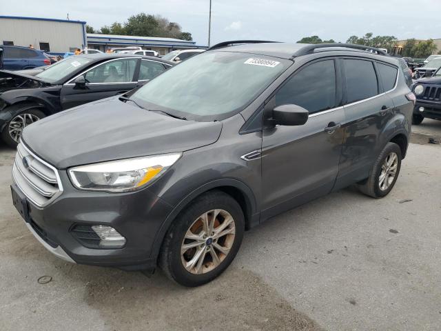 FORD ESCAPE SE 2018 with VIN 1FMCU9GD3JUD07201 - Photo from auction