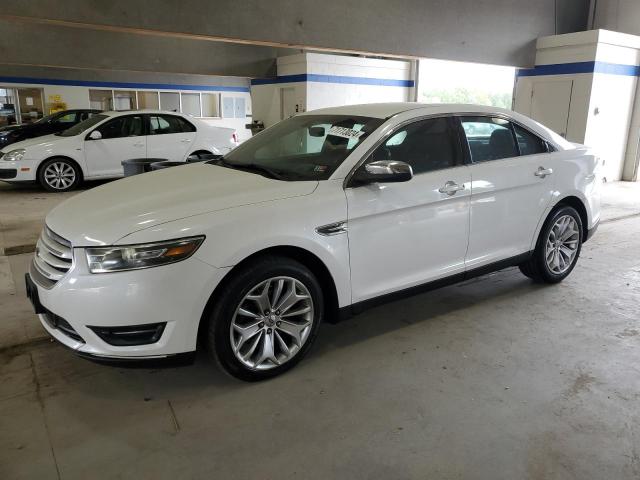 FORD TAURUS LIM 2014 with VIN 1FAHP2F85EG168700 - Photo from auction