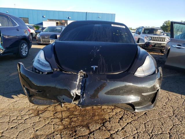 Photo 5 from auction – 2019 TESLA MODEL 3 with VIN 5YJ3E1EA2KF399651