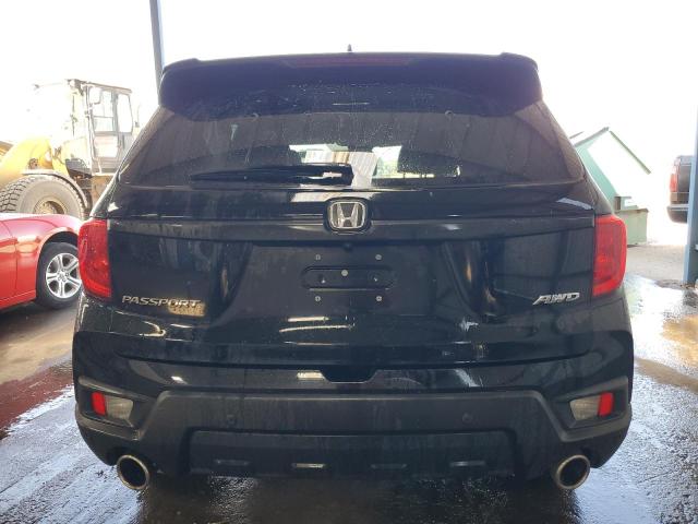 Photo 6 from auction – 2022 HONDA PASSPORT E with VIN 5FNYF8H5XNB008129