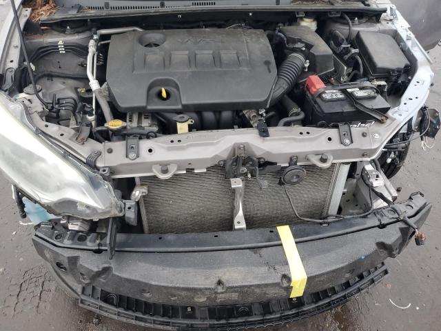 Photo 11 from auction – 2014 TOYOTA COROLLA L with VIN 2T1BURHE3EC221252