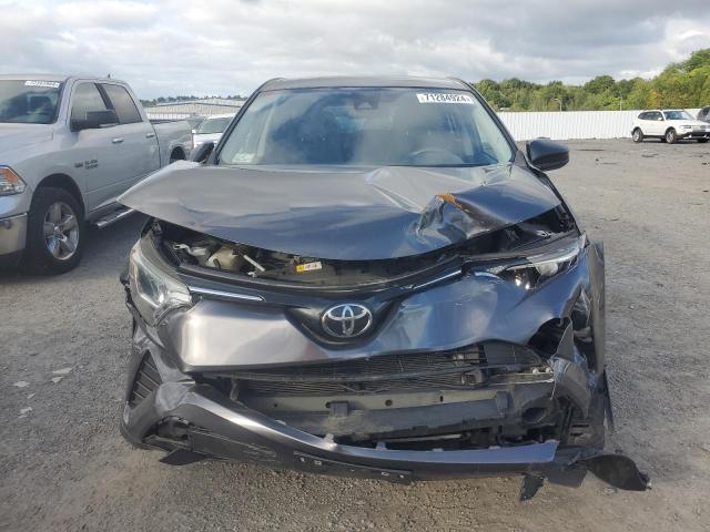 Photo 5 from auction – 2018 TOYOTA RAV4 LE with VIN JTMBFREV4JJ725869