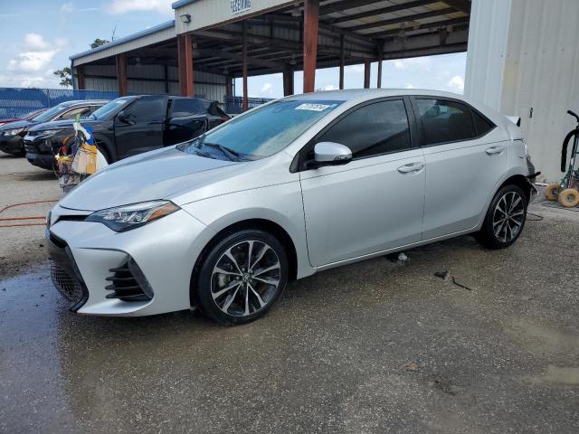 TOYOTA COROLLA SE 2018 with VIN 5YFBURHE3JP816628 - Photo from auction