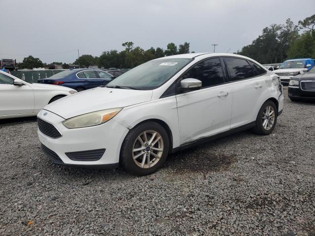 FORD FOCUS SE 2015 with VIN 1FADP3F21FL263201 - Photo from auction