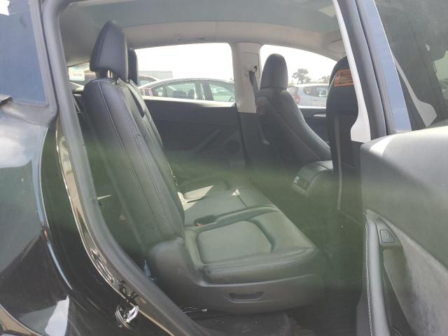 Photo 11 from auction – 2023 TESLA MODEL Y with VIN 7SAYGAEE1PF909386