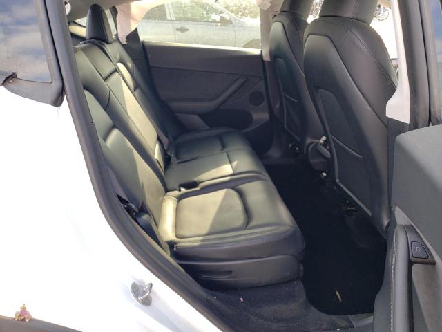 Photo 11 from auction – 2023 TESLA MODEL Y with VIN 7SAYGAEE3PF753948