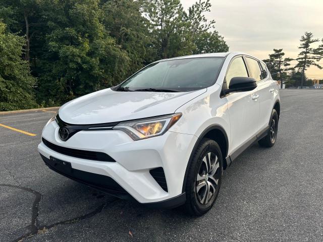 Photo 2 from auction – 2018 TOYOTA RAV4 LE with VIN 2T3BFREV8JW776938