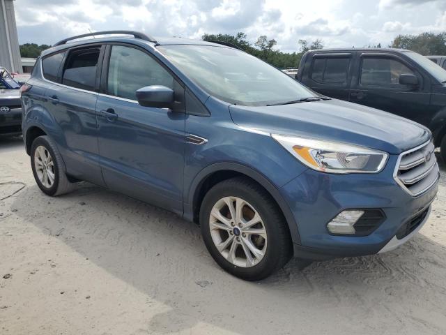 Photo 4 from auction – 2018 FORD ESCAPE SE with VIN 1FMCU0GD9JUC27641