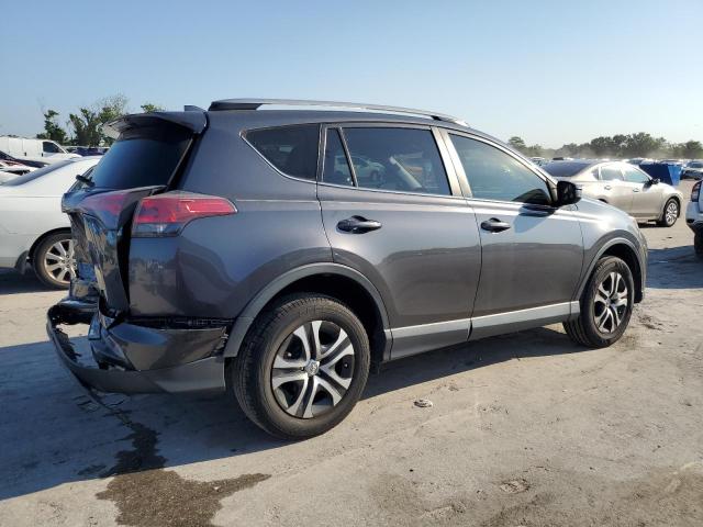 Photo 3 from auction – 2017 TOYOTA RAV4 LE with VIN JTMZFREV9HJ131870