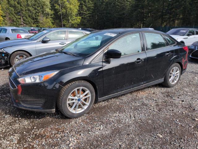 FORD FOCUS SE 2018 with VIN 1FADP3FE8JL246902 - Photo from auction