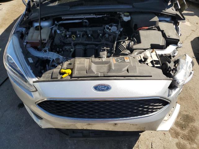 Photo 11 from auction – 2018 FORD FOCUS SE with VIN 1FADP3F2XJL312128