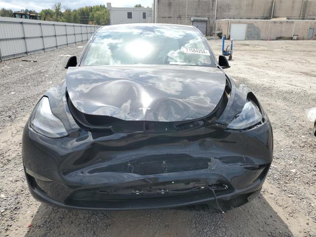 Photo 5 from auction – 2023 TESLA MODEL Y with VIN 7SAYGDEE1PF796606