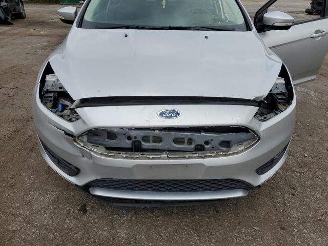 Photo 11 from auction – 2015 FORD FOCUS SE with VIN 1FADP3F28FL229482